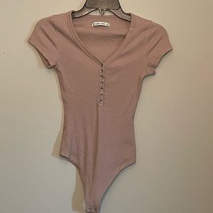 Button down body suit